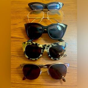 5 pair of sunglasses